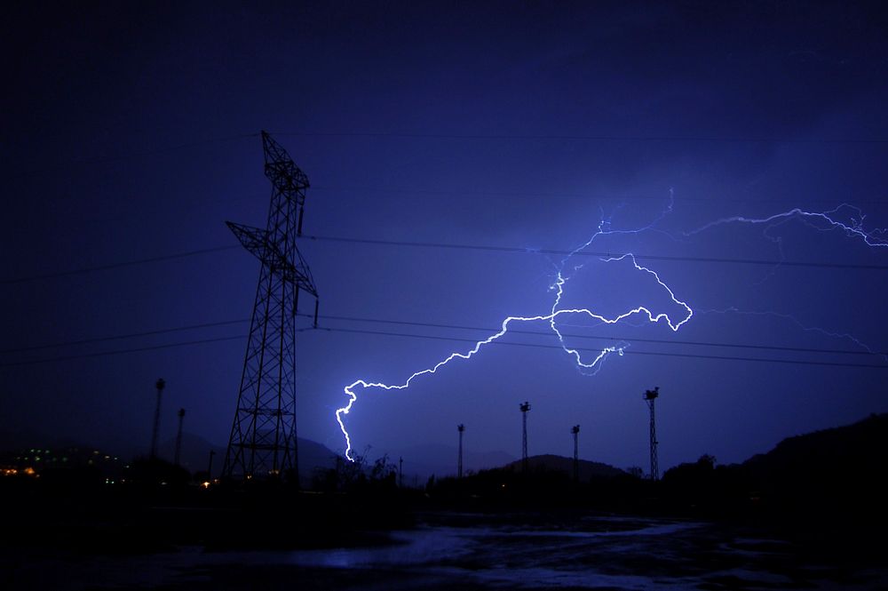 Lightning near utility pole image. Free public domain CC0 photo.