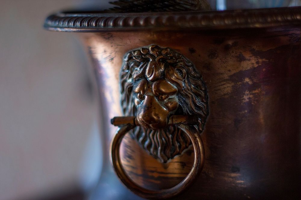 Vintage lion copper decoration. Free public domain CC0 photo.