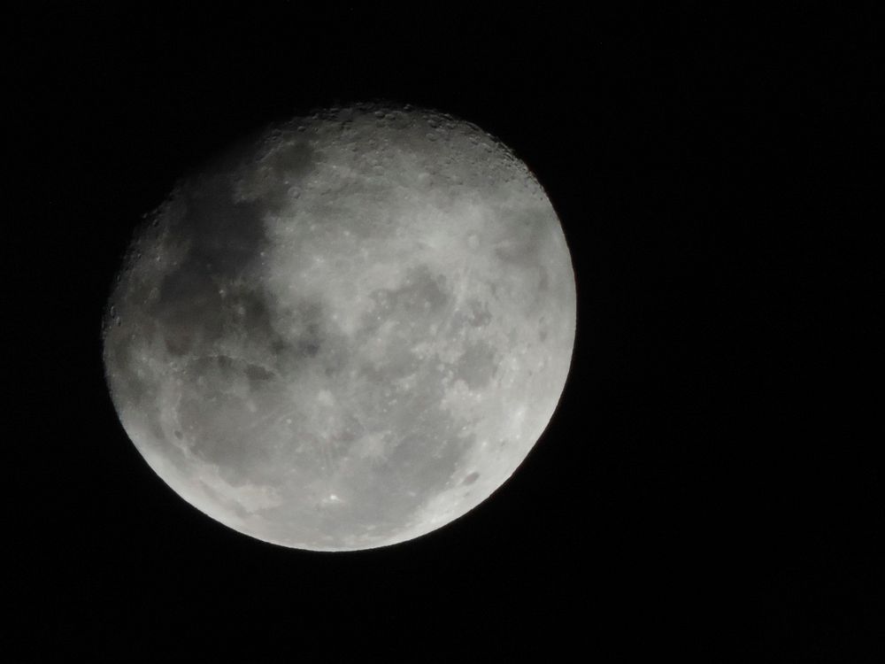 Waning moon in dark sky. Free public domain CC0 photo.