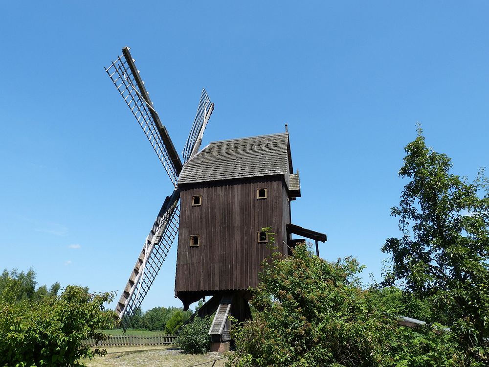 Old windmill in countryside. Free public domain CC0 photo.