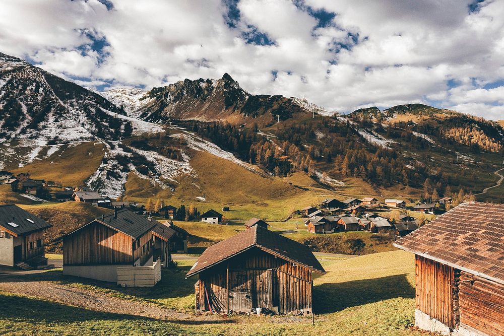 Little houses by the mountains. Free public domain CC0 photo.