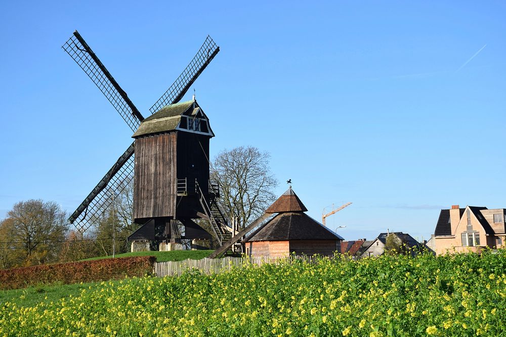 Rustic windmill building in the countryside. Free public domain CC0 image.