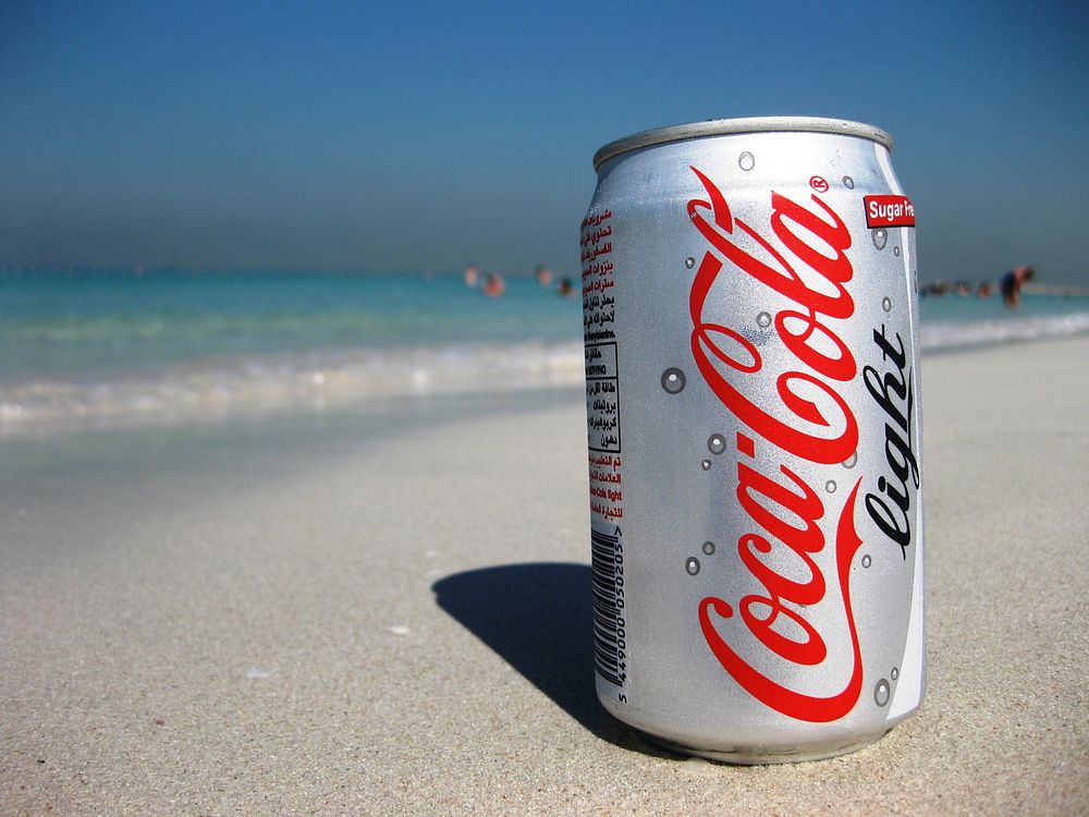 Coca Cola light tin can on the beach, location unknown, date unknown