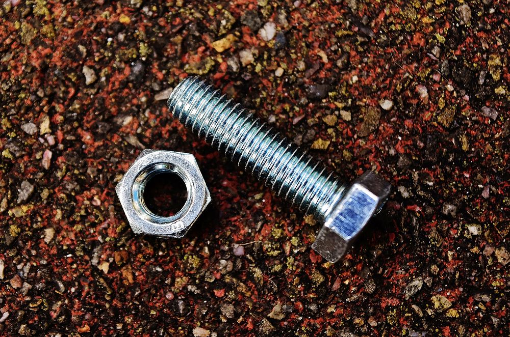 Silver hex nuts and bolt. Free public domain CC0 photo.