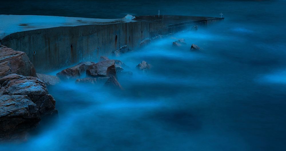 Blue misty sea at night. Free public domain CC0 image.