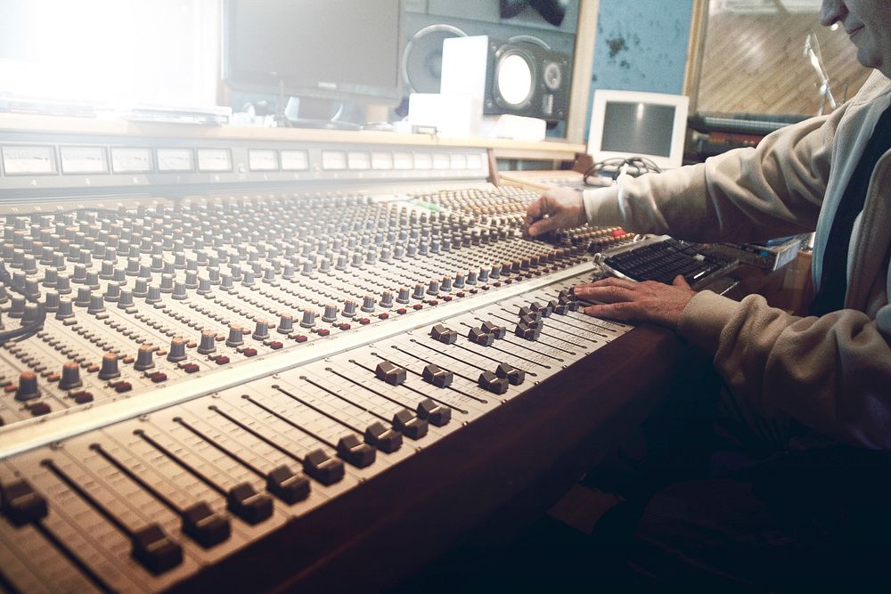 Producer in recording studio, free public domain CC0 photo.