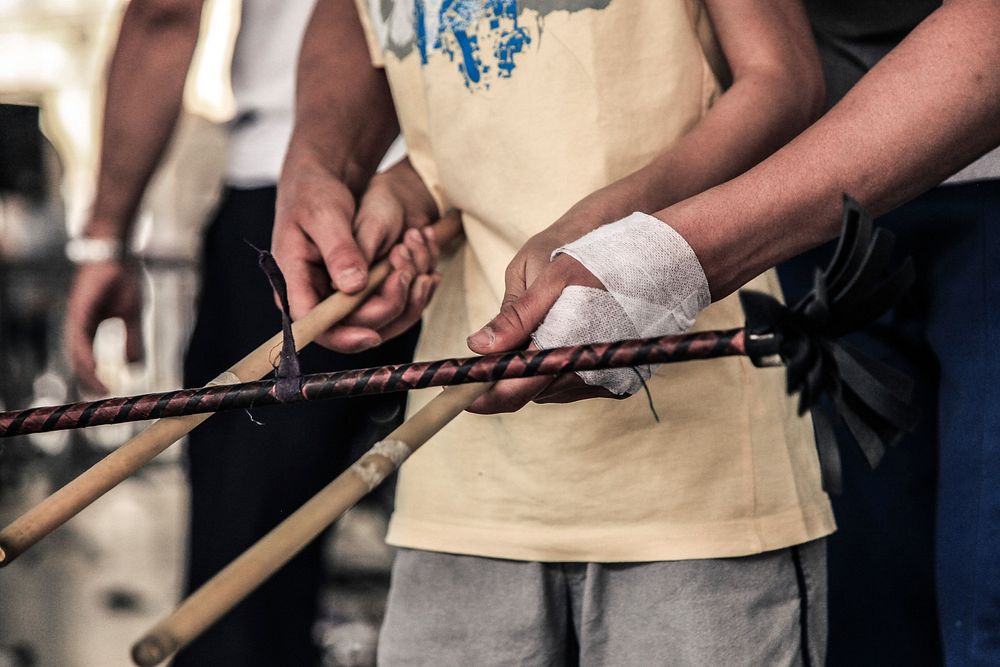 Learning to juggle sticks, free public domain CC0 photo