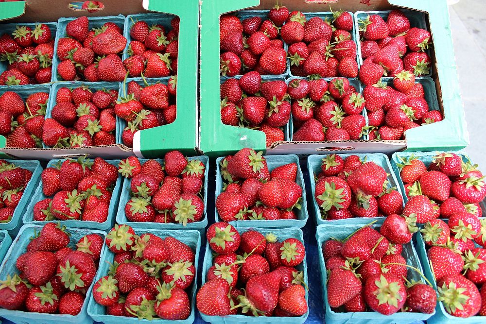 Fresh strawberries in carton paper boxes. Free public domain CC0 image.