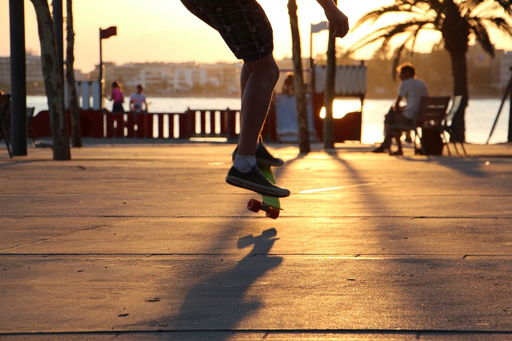 Skateboarding in the park. Free public domain CC0 photo.