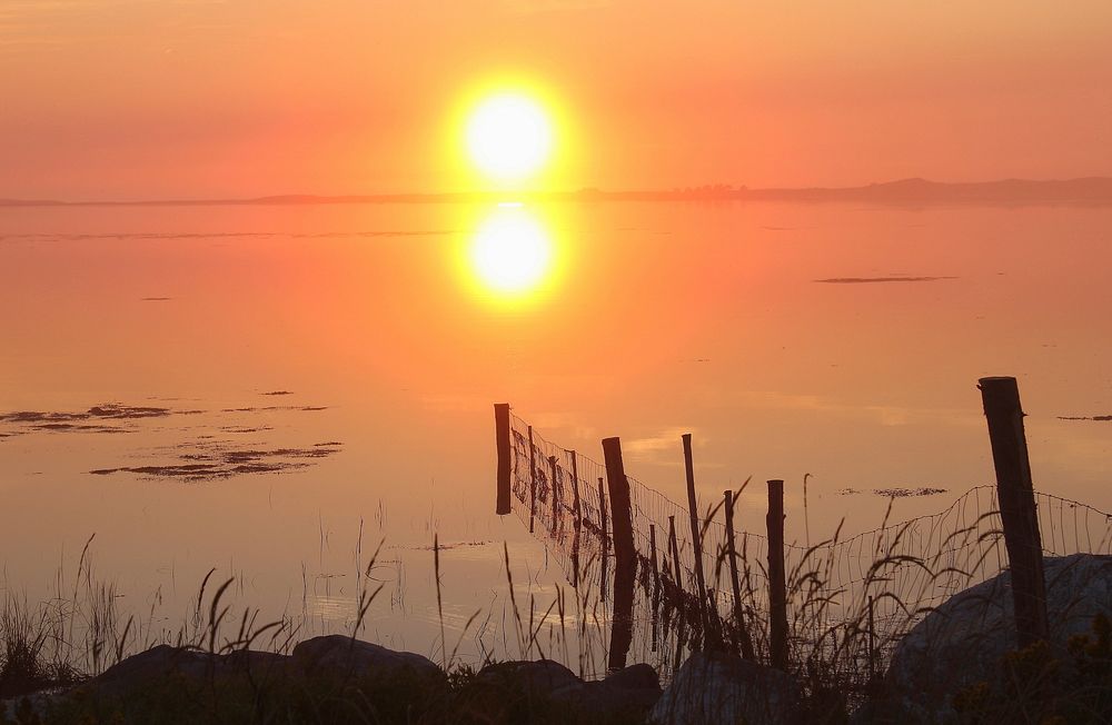 Beautiful orange sunset scenery photography. Free public domain CC0 image.