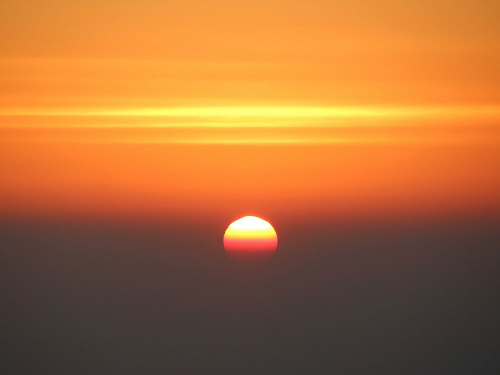 Beautiful orange sunset scenery photography. Free public domain CC0 image.