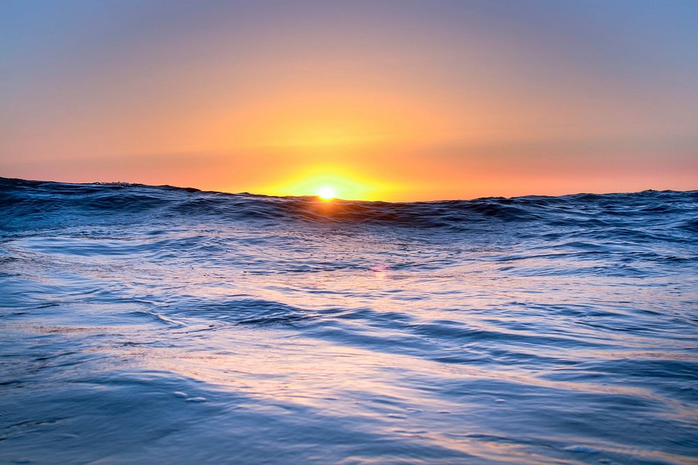 Beautiful beach sunset seascape scenery. Free public domain CC0 image.