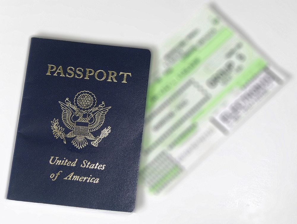 Passport with boarding pass. Free public domain CC0 image.