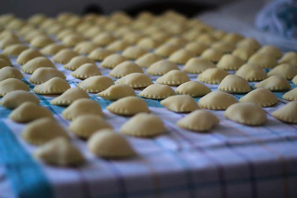 Closeup on uncooked Mezzelune pasta. Free public domain CC0 image.