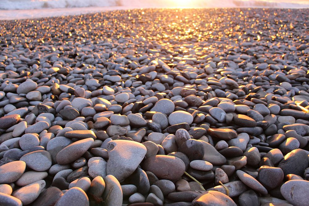 Stones on beach. Free public domain CC0 image.