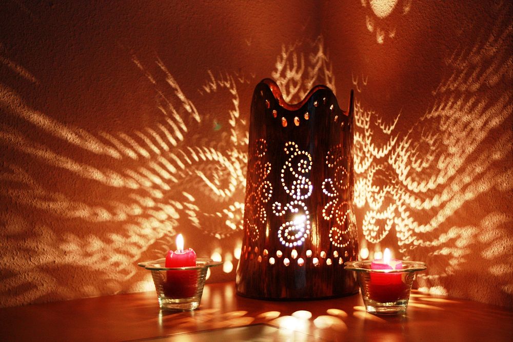 Decorative candles and lantern. Free public domain CC0 photo.