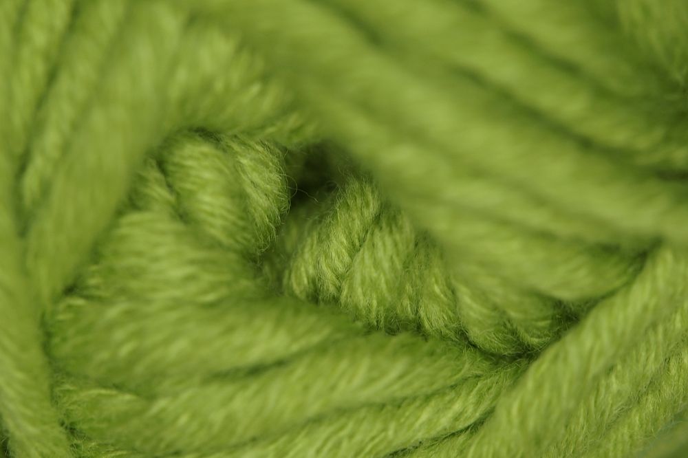 Close up green thread. Free public domain CC0 photo.