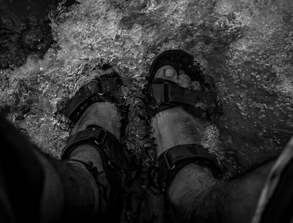 Feet in water, background photo. Free public domain CC0 image.