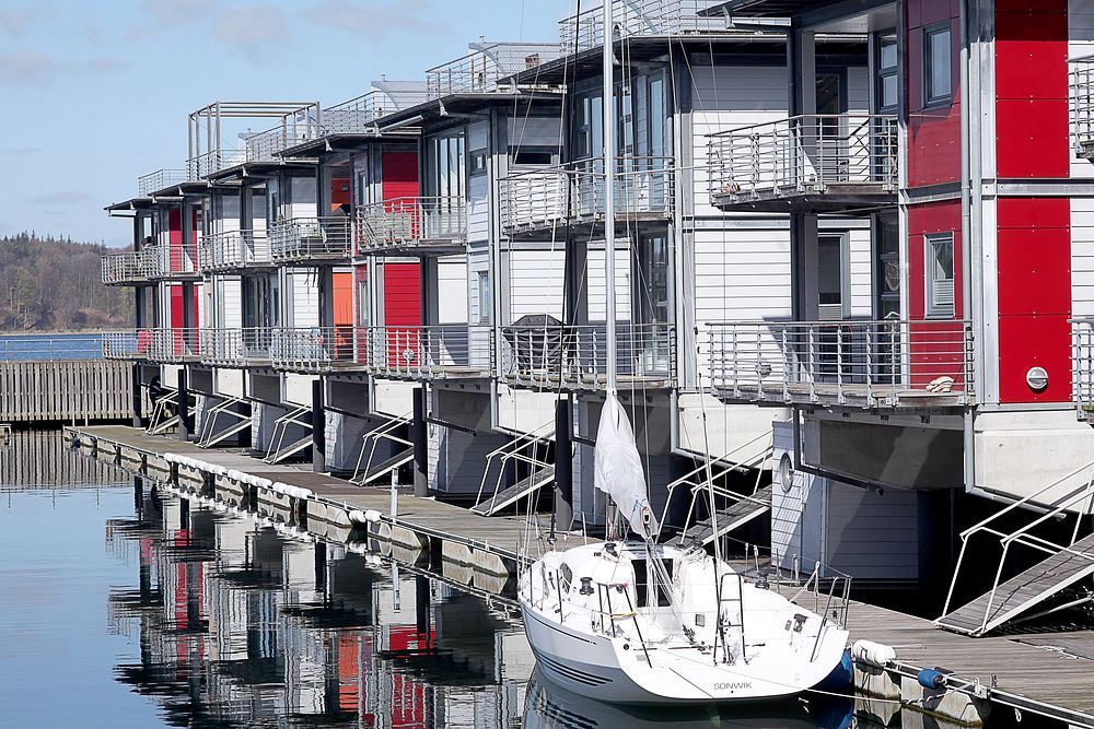 Yacht docking by the marina. Free public domain CC0 photo.