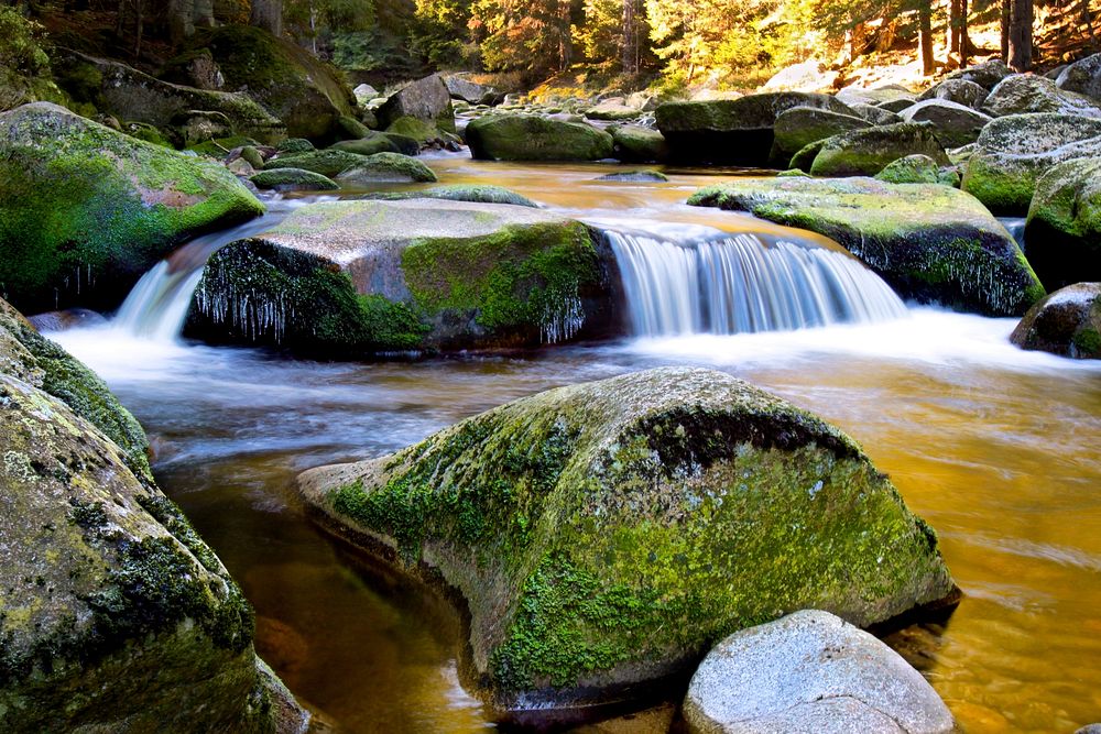 Water flowing down stones. Free public domain CC0 image.