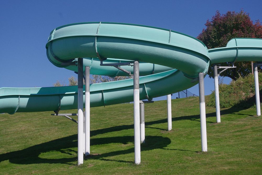 Water slide in amusement park. Free public domain CC0 image.