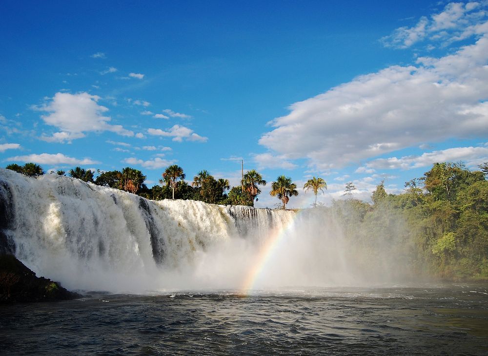 Beautiful rainbow waterfall scenery. Free public domain CC0 image.