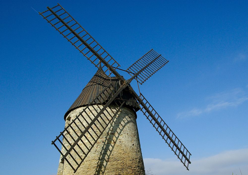 Old windmill in countryside. Free public domain CC0 image.