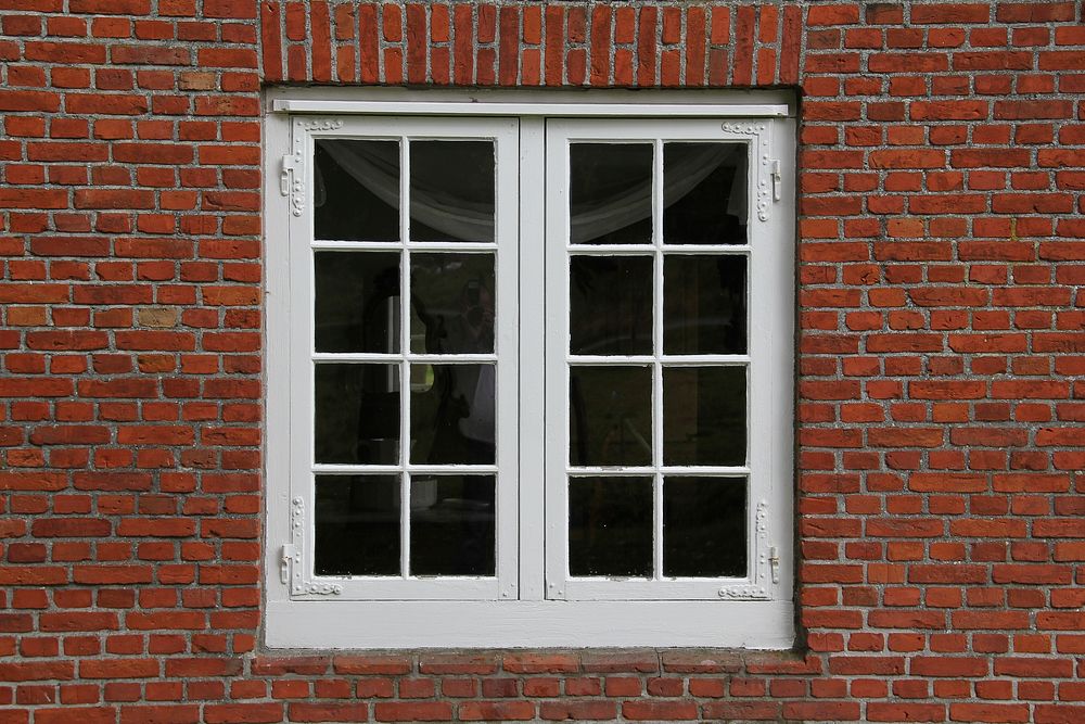 Window, brick wall. Free public domain CC0 image.