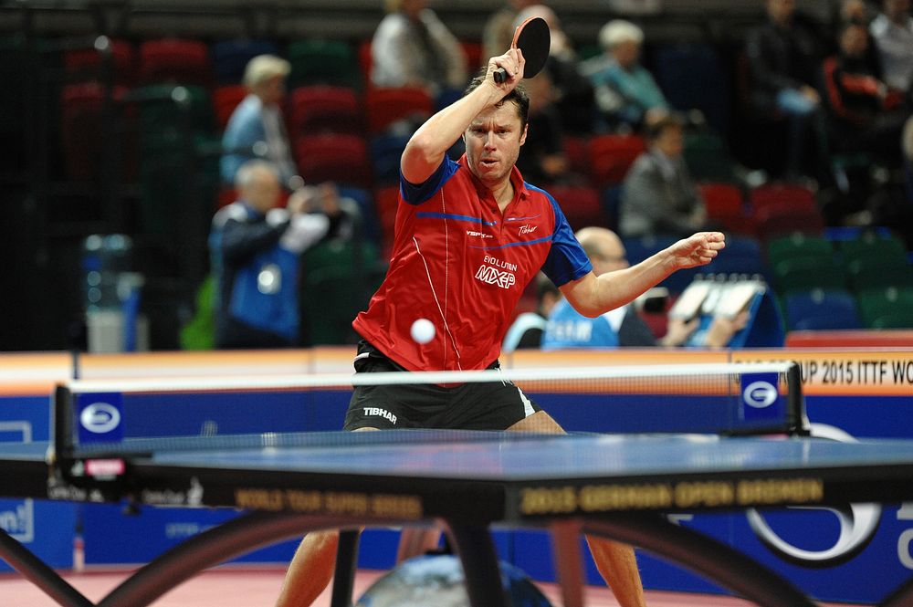 Professional table tennis player during game, location unknown, February 18, 2016. View public domain image source here