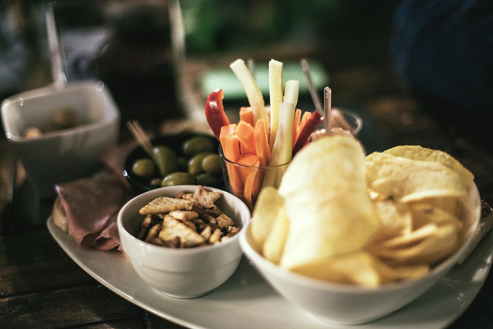 Closeup on different savory snacks. Free public domain CC0 image.