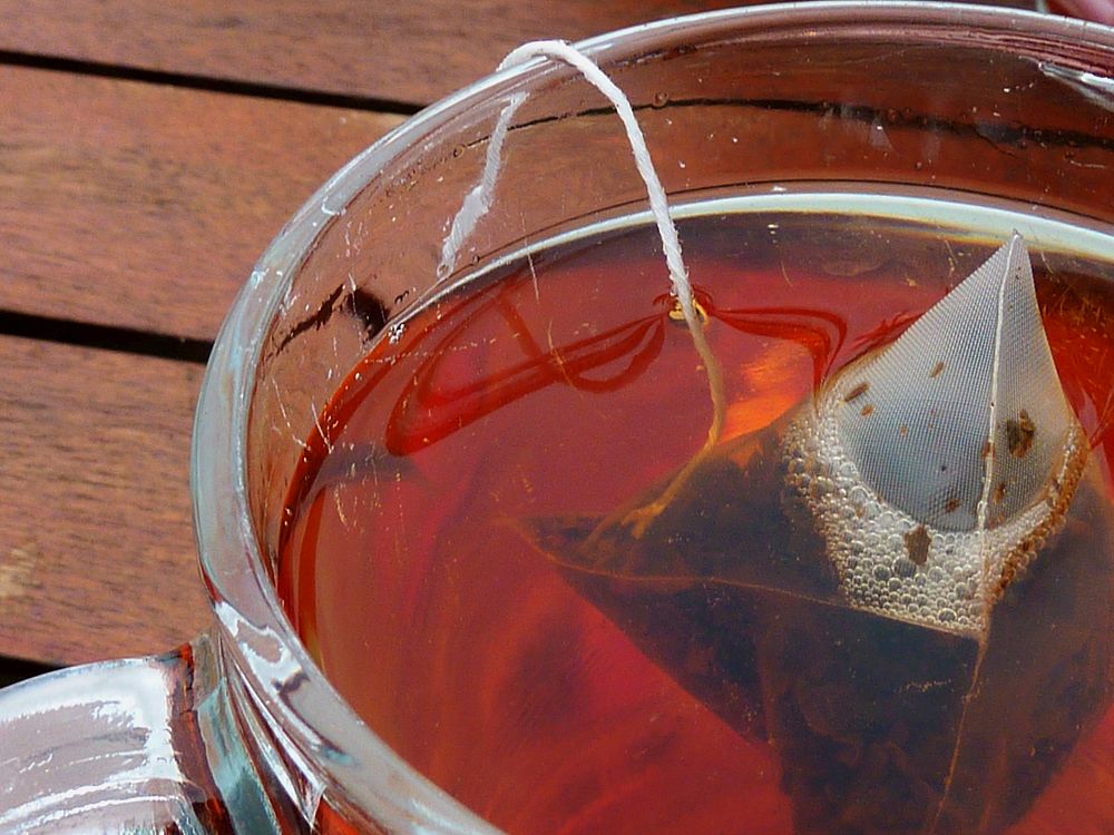 Tea cup & teabag. Free public domain CC0 photo