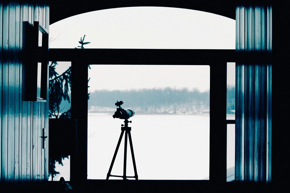 Telescope in window. Free public domain CC0 photo.