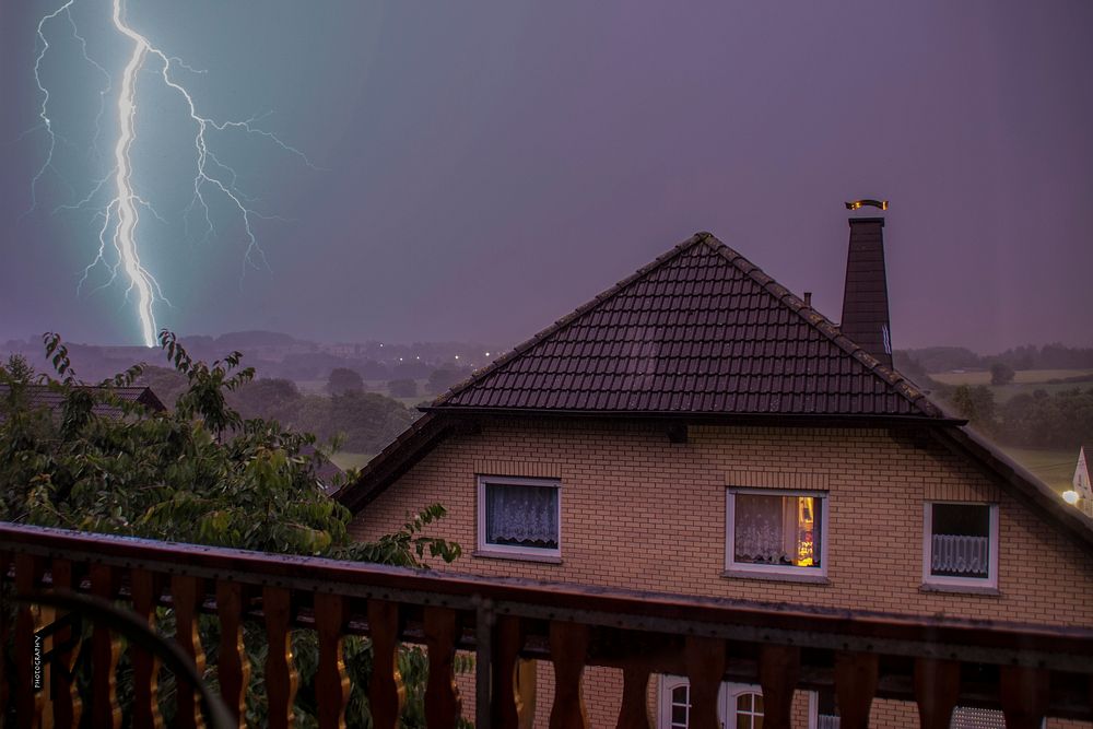 Lightning near house. Free public domain CC0 photo.