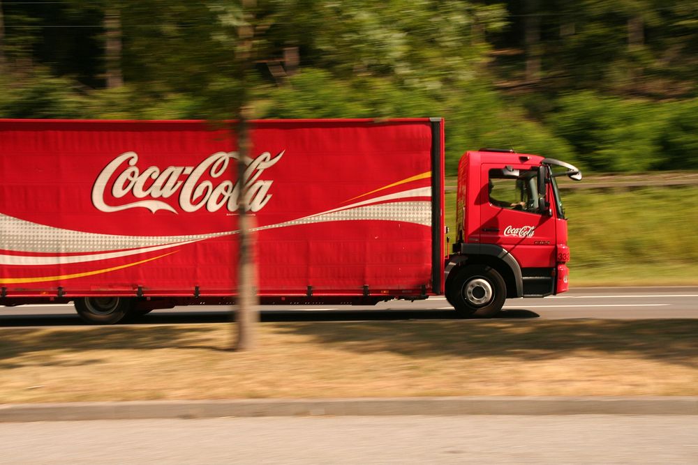 Running Coca Cola Coke truck, location unknown, date unknown