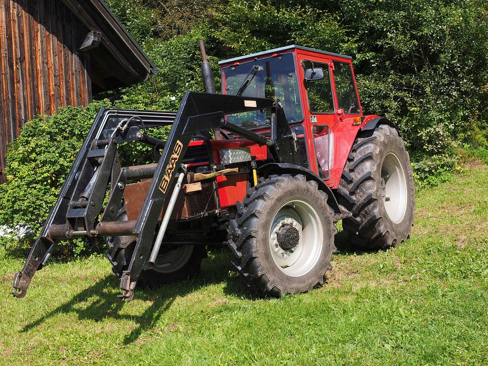 Tractor in a farm. Free public domain CC0 photo