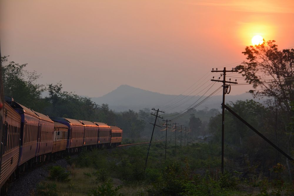 Train with sunrise. Free public domain CC0 photo.