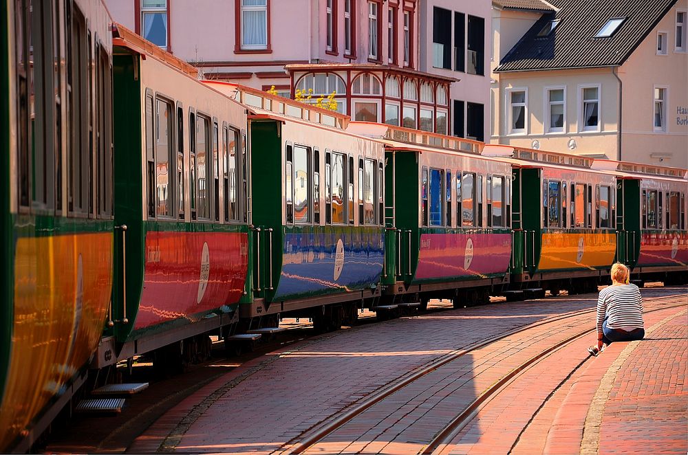 Train travelling on a track. Free public domain CC0 photo.