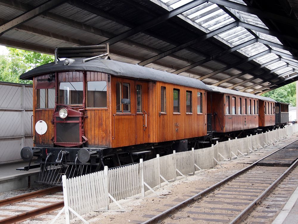 Moving train on a track. Free public domain CC0 photo.
