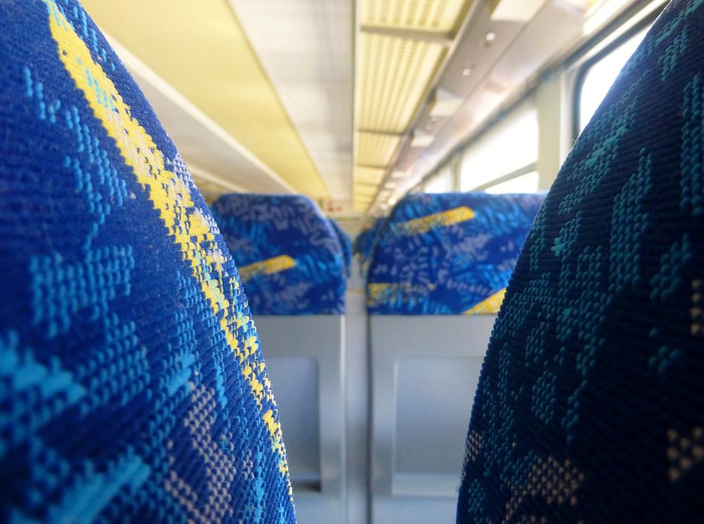 Passenger seats inside a train. Free public domain CC0 photo.