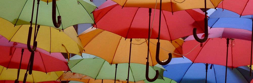 Colorful umbrella background. Free public domain CC0 photo.