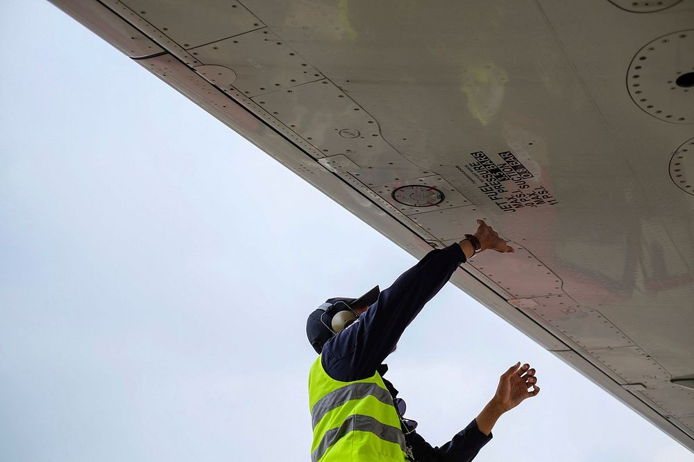 Free person fixing roof, public domain CC0 image.