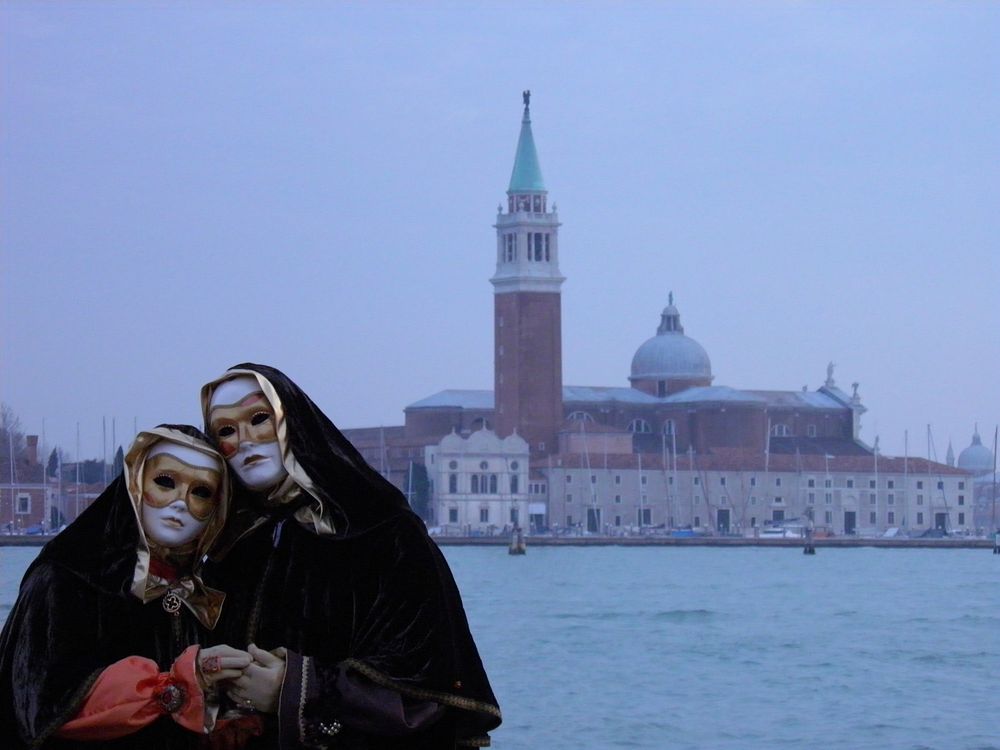 Venetian costume and mask. Free public domain CC0 photo.