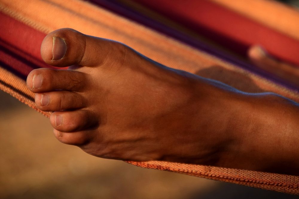 Free close up foot from relaxing on Hammock image, public domain people CC0 photo.