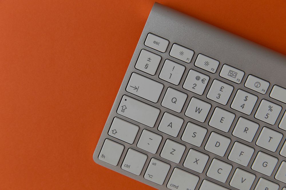 Keyboard On Orange Background. Free public domain CC0 image.