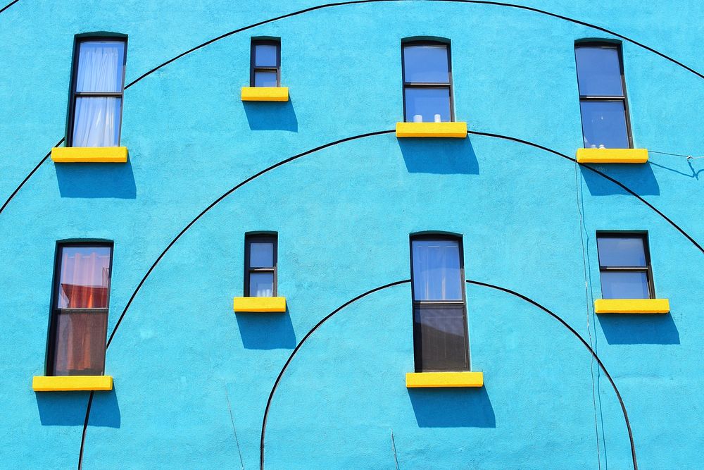 Free yellow window on blue wall public domain CC0 photo.