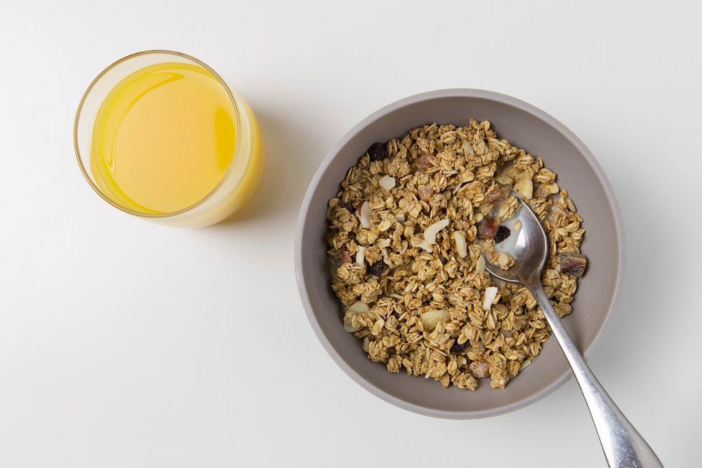 Free granola breakfast with juice photo, public domain food CC0 image.