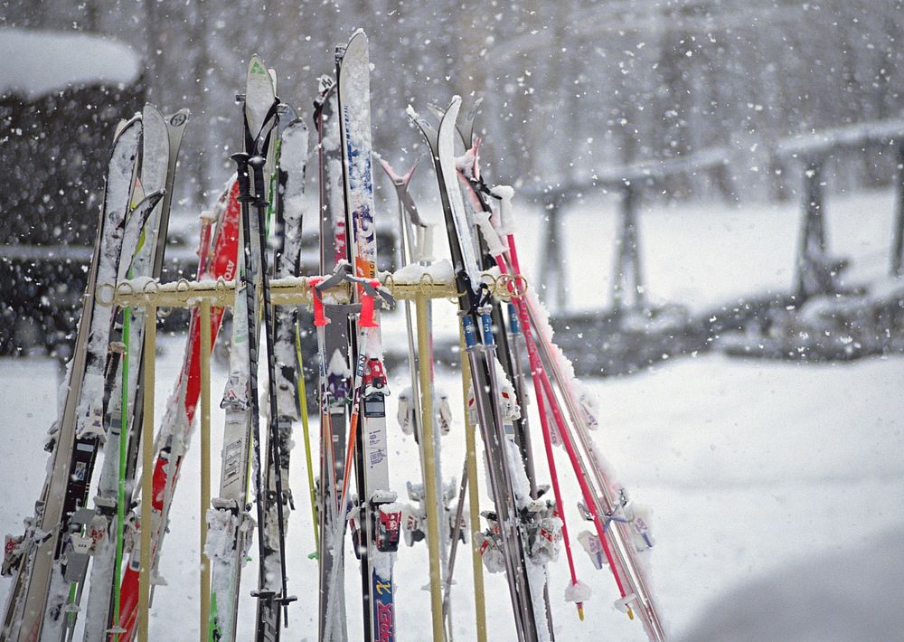 Free stacked ski equipment photo, public domain CC0 image.