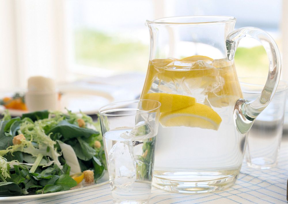 Free salad and detox water jug on table photo, public domain food CC0 image.