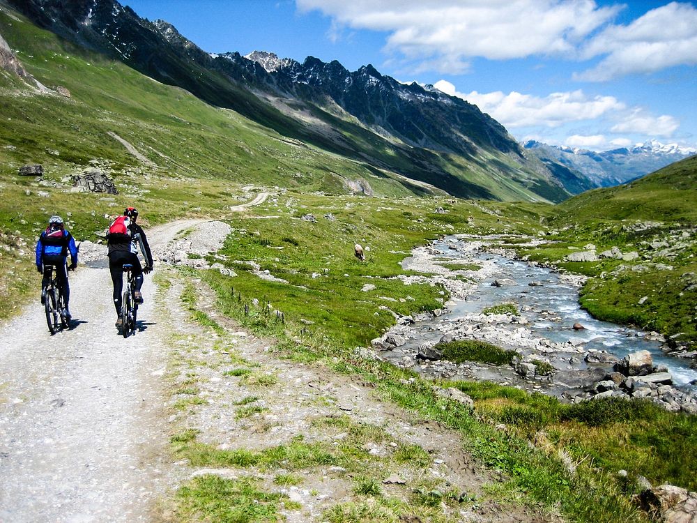 Free cycling down a mountain image, public domain landscape CC0 photo.