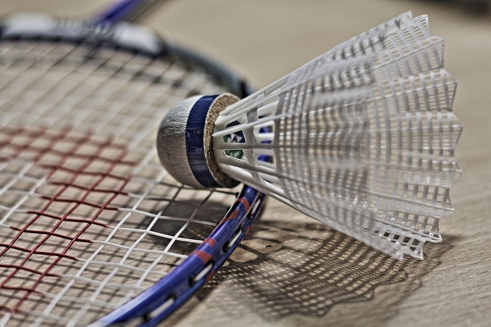 Free badminton racket and shuttlecock image, public domain sports CC0 photo.